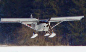 STOL CH 701 on wheel skis