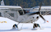 STOL CH 701 on wheel skis