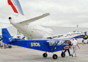STOL CH 701 in front of an Air France 747 