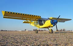 STOL CH 701 on dirt field...