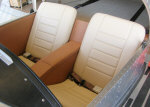 Upholstered seats and cabin side panels.